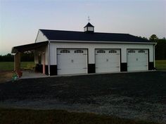 two garages are shown in front of a large field