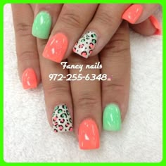 Orange And White Acrylic Nails Designs, Neon Cheetah Nail Designs, Leopard Nail Designs Summer, Mint And Orange Nails, Coral And Green Nails, Spring Leopard Nails, Colorful Cheetah Print Nails, Fun Neon Nails, Summer Leopard Nails