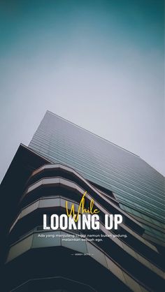 looking up with the words we are looking up in front of a tall, modern building