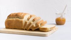 a loaf of bread sitting on top of a cutting board