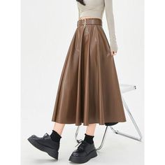 Discover Timeless Elegance Step into the world of sophistication and style with our Elegant High-Waist Faux Leather Skirt. This exquisite piece, perfect for the autumn and winter seasons, combines elegance with a contemporary twist, making it a must-have for your wardrobe. Crafted for the modern woman, this skirt is not just a garment; it's a statement of style and confidence. Product Features Our skirt boasts a classic A-line silhouette, ensuring a flattering fit for all body types. The high wa Rock Hat, Black And Khaki, Skirt With Belt, Cardigan Sweater Vest, Evening Outfits, Faux Leather Skirt, Khaki Color, Winter Wear, Autumn And Winter