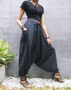 "The harem style trousers made from cotton fabric 100%with an elasticated smock waist and ankles they provide a comfortable lightweight fit, perfect for casual wear, festivals, yoga, holidays as well as pairing with a plain top to get that popular look. D I S C O U N T & P R O M O T I O N ❤ Buy 2 or more items, get 10% off ❤ Buy 4 or more items, get 15% off ENTER the coupon code: IYARA015 ❤ Buy 6 or more items, get 15% off ENTER the coupon code: IYARA020 PLEASE NOTE I can not apply a discoun Casual Harem Pants For Festivals, Casual Festival Harem Pants, Relaxed Fit Harem Trousers For Festivals, Hippie Harem Pants With Elastic Waistband, Bohemian Harem Parachute Pants With Elastic Waistband, Ankle-length Relaxed Fit Harem Pants, Black Ankle-length Cotton Harem Pants, Bohemian Baggy Harem Pants With Pockets, Cotton Drop Crotch Harem Pants For Yoga