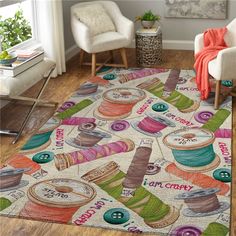 an area rug with sewing related items on it