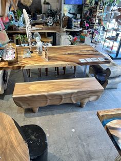 several wooden benches sitting in a room next to each other