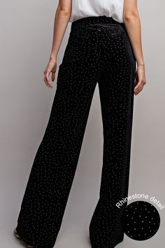 Rhinestone Velvet Wide Leg Pants Brand: EE:SOME Style: PK9053 Fabric: 100% POLYESTER Details: Velvet pants featuring rhinestone detailing throughout, a side zipper closure and is a straight leg style. **MATCHING BLAZER STYLE # JK9596 ** Glamorous Embellished Wide Leg Pants, Glamorous Evening Pants With Rhinestones, Embellished Wide Leg Evening Pants, Elegant High Waist Velvet Bottoms, Black Embellished Wide Leg Bottoms, Embellished Straight Leg Evening Bottoms, Elegant Full-length Embellished Bottoms, Black Velvet Bottoms For Night Out, Black Velvet Pants For Party