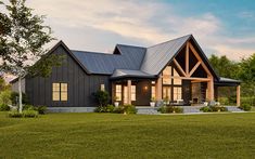 this is an artist's rendering of a modern farmhouse style home with metal roofing