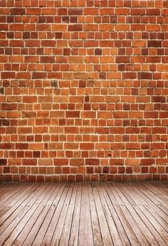 an old brick wall with wood flooring in the foreground and a wooden floor to the side