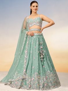 Elevate your ethnic style with our beautiful sea green sequins chiffon reception wear lehenga choli. This stunning outfit features intricate sequin and coding thread embroidered work that adds a touch of elegance and sophistication to your look.
The sea green color exudes a sense of serenity and freshness, making it perfect for festive occasions or casual events where you want to stand out.
The lehenga is semi-stitched up to 42 inches with a 3.0-meter flair, allowing for a comfortable and flatte Lehenga With Jewellery, Jade Lehenga, Lehenga For Mehndi, Sea Green Lehenga, Chiffon Lehenga, Three Quarter Sleeve Blouses, Georgette Lehenga, Lehenga Choli Wedding, Indian Lehenga Choli