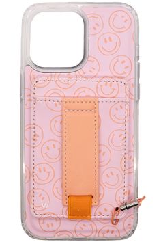 a pink case with smiley faces on it and an orange strap around the back pocket