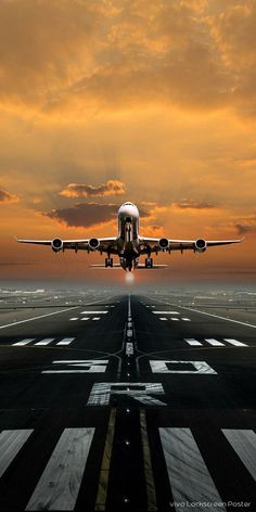 an airplane is taking off from the runway at sunset or dawn, with clouds in the background