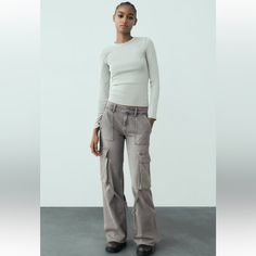 New With Tag Zara Fw 2023 Collection Offers Welcome Approximate Measurements Laying Flat: * Waist: 19” * Hip: 26.5” * Front Rise: 11” * Inseam: 32” * Outseam: 44” * Leg Opening: 13.5” * Size: 14 Cargo - Mid-Rise Mid-Rise Jeans With Front Pockets, And Patch Pockets At Back And Leg. Belt Loop Detail. Front Zip And Metal Button Closure. Anthracite Grey | 8197/237 Outer Shell 82% Cotton 18% Lyocell Zara Fitted Casual Cargo Pants, Fitted Zara Cargo Pants With Pockets, Zara Fitted Cargo Pants For Work, Fitted Zara Cargo Pants, Fitted Zara Cargo Pants For Work, Zara Fitted High Waist Cargo Pants, Jeans With Front Pockets, Studded Leggings, Womens White Jeans