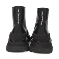 Alexander McQueen boots in black leather with a chunky rubber sole, a front lace up closure, and a white logo on the back. Includes box. Brand = Alexander McQueen Condition = 7/10, good, creasing to leather, wear to sole Size = 6.5 Material = Leather SKU = 11258-46 Modern Platform Boots With Round Toe For Streetwear, Modern Round Toe Platform Boots For Streetwear, Streetwear Leather Ankle Platform Boots, Leather Platform Boots With Rubber Sole For Streetwear, Black Lace-up Boots With Lug Sole For Streetwear, Streetwear Ankle Platform Boots With Lug Sole, Streetwear Ankle Lace-up Boots With Lug Sole, Streetwear Ankle Boots With Lug Sole, Streetwear Ankle Boots With Rubber Sole