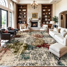 a living room filled with furniture and a fire place in the middle of a room