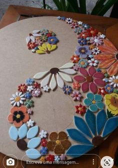 a table with flowers on it that is made out of paper