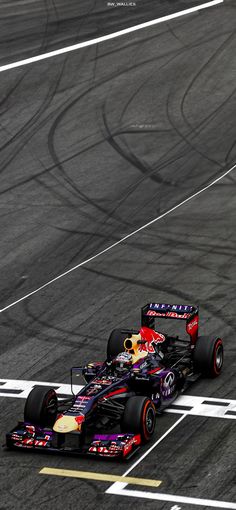 a red bull racing car on a race track