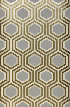 an abstract wallpaper with hexagonal shapes in grey and gold colors, as well as white lines