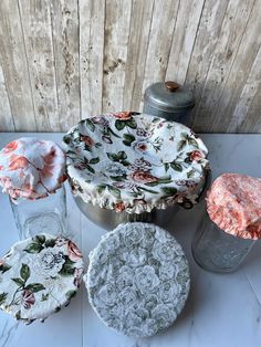 three cakes sitting on top of a table next to each other