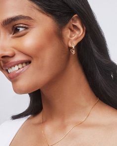 Designed to last, a chain linked hoop in trending two tone finish. The Wren Hoop Earrings in Mixed Metal are a true statement, elevated by a mix of 18k Gold Vermeil and Sterling Silver. Cable Chain Earrings In Fine Jewelry Style, Dangle Hoop Earrings With Cable Chain, Elegant Yellow Gold Hoop Earrings With Cable Chain, Wren, Mixed Metals, Kendra Scott, 18k Rose Gold, Chain Link, Gold Vermeil