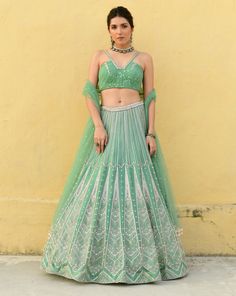 Wedding Green Hand Embellished Choli, Elegant Organza Lehenga With Dori Work, Elegant Lehenga With Dori Work Organza, Festive Hand Embellished Green Choli, Elegant Georgette Choli With Dori Work, Elegant Gown With Dori Work For Navratri, Anarkali Green Hand Embellished Choli, Green Hand Embellished Choli With Traditional Drape, Elegant Choli With Dori Work For Reception