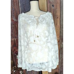 Description: Sheilay Womens Sheer Peasant Blouse Size M White Long Sleeve Front Tie Nwt Features: Long Sleeve Elastic Neckline With Tie Front Embroidered Detail Elastic Cuffs Sheer Fabric Boutique Can Be Worn Off-The-Shoulder Gold Accent On Edge Of Florals Size: Womens M Condition: New With Tags Please View All Photos To Best Determine The Item Condition. Most Items We Sell Are Pre-Owned So Please Have Reasonable Expectations. If There Are Still Questions Regarding Condtion, Contact Us Before Yo White Bohemian Peasant Top With Lace, Elegant Cream Peasant Top For Spring, Chic White Peasant Top With Lace Trim, Feminine White Peasant Top For Beach, White Peasant Top With Lace Trim For Beach, White Lace Trim Peasant Top For Brunch, Elegant White Peasant Top With Lace Trim, Elegant Lace Blouse For Vacation, Elegant Lace Trim Blouse For Vacation