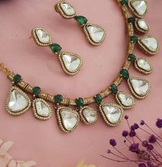 This Gorgeous  Gold  Necklace with matching earrings. Comprises of Fine Oversized Uncut Kundan polki stones with navratan stone Fine quality and craftsmanship. Perfect for desi weddings. Necklace comes in drawstring cord therefore adjustable Earrings length: Approx 2.5 inches Kundan Necklace With 17 Jewels, Diwali Kundan Necklace With 17 Jewels, Chandbali Kundan Necklace With 17 Jewels For Festive Occasions, Festive Chandbali Kundan Necklace With 17 Jewels, Polki Necklace, Kundan Necklace, Pakistani Jewelry, Desi Wedding, Jewelry Indian