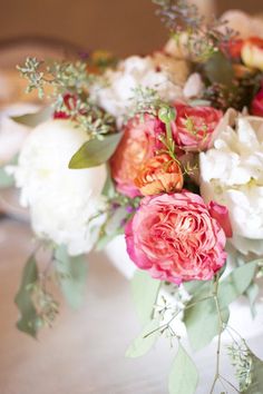 an arrangement of flowers with the title how to arrange flowers for your wedding bouquets