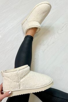 Step up your shoe game with the Makenna Sherpa Platform Boots, the ultimate mix of cozy and cool! These boots feature plush sherpa accents and a chunky platform sole that adds just the right amount of height while keeping you comfy!

Pair them with skinny jeans and an oversized sweater for a laid-back, cozy look, or style them with a flowy dress and tights for a playful, edgy vibe. Whether you're running errands or grabbing coffee with friends, these boots bring warmth and style to every step. Cozy Round Toe Boots For Cold Weather, Cozy Cold Weather Boots With Round Toe, Cozy Round Toe Booties For Fall, Cozy Fall Booties With Round Toe, Comfortable Synthetic Winter Boots, Casual Winter Booties With Padded Ankle, Trendy Cream Platform Boots For Winter, Cream Round Toe Winter Booties, Comfortable Cream Winter Booties