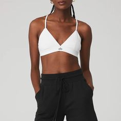 Splendor Bra - White/Black | Alo Yoga Alo Yoga Sport Bras, Alo Yoga Bra, Trendy White Sports Bra With Built-in Bra, Alo Yoga Light Support Sporty Sports Bra, Sporty Bra-friendly Activewear By Alo Yoga, Alo Yoga Athleisure Bra-friendly Top, Alo Yoga Athleisure Bra Friendly Top, Alo Yoga Athleisure Sports Bra With Light Support, Alo Yoga Light Support Sports Bra For Athleisure