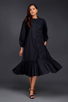 Black shirt dress with matching pleated frill detailing on one side. - Aza Fashions Elegant Cotton Dress With Pintucks, Cotton Ruffle Dress For Workwear, Long Sleeve Formal Dress With Pintucks, Formal Long Sleeve Dress With Pintucks, Chic Long Sleeve Dress With Pintucks, Black Dress With Pleated Sleeves For Daywear, Cotton Knee-length Dress With Pleated Sleeves, Black Long Sleeve Dress With Pleated Hem, Elegant Pleated Button-up Shirt Dress