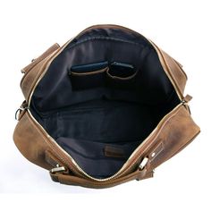 Material: Crazy Horse Genuine Leather Color: Brown Dimensions/Size: Width: 42cm/ 16.5 inch Tall(Height): 30cm/ 12 inch Thick: 13cm/ 5 inch Weight: 2.2 kg Style: Tote, Shoulder Bag Use for: Travel bag Capacity: Large capacity, can hold 15"inch laptop, hold over 5 sets of clothes, several A4 size books and magazines. Feature: - Front: 2 magnet button pockets with cover + 4 zipper pockets - Two sides: 2 magnet button pockets - On the back: one large zipper pocket - On the top: one main large closur Leather Lined Satchel Bag For Trips, Leather Lined Tote Shoulder Bag For Trips, Classic Shoulder Bag For Trip, Classic Shoulder Bag For Trips, Luxury Satchel Travel Bag With Zipper, Luxury Travel Laptop Tote Bag, Luxury Satchel Travel Bag With Zipper Closure, Luxury Shoulder Travel Bag With Zipper Closure, Leather Lined Tote Bag For Business Trips