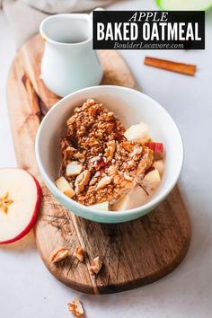 an apple and cinnamon baked oatmeal in a bowl on a cutting board