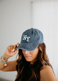 Embroidered "NY" baseball cap with an adjustable strap and washed coloring. Brim: 2.75" 100% Cotton Ny Baseball Cap, Ny Baseball, Vintage Havana, Graphic Tops, Baseball Cap, Adjustable Straps, Short Dresses, Active Wear, Graphic Tees