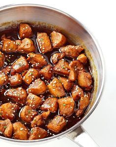 a pan filled with meat covered in sauce