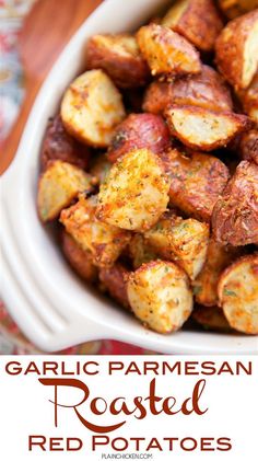 garlic parmesan roasted red potatoes in a white bowl with text overlay that reads garlic parmesan roasted red potatoes