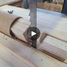 a piece of wood being cut into pieces with a circular sawtoother on it