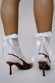 Socks with bow detail Heels With Frilly Socks, Heel With Socks Outfit, Shoes With Socks Outfit Fashion, Ruffle Socks With Heels, Over The Knee Socks Outfit Casual, Lace White Socks, Socks In Heels, Ballet Flats With Bow, Socks Bow