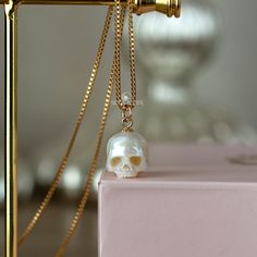 Gold Skull-shaped Engraved Jewelry, Luxury Skull Jewelry For Gifts, Yellow Gold Skull Jewelry For Gift, Luxury Skull Shaped Jewelry For Gift, Gold Skull Jewelry Collectible, Gold Skull Jewelry For Collectors, Gold Skull Collectible Jewelry, Symbolic Skull Shaped Jewelry For Gift, White Skull Shaped Jewelry Gift