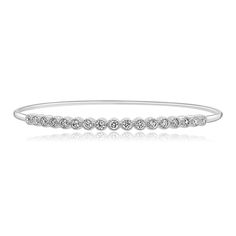 18ct white gold diamond bangle.
Oval shaped bangle, with 17 round brilliant diamonds, set in a rub over setting with beaded edge.
Concealed fastening. 
The diamonds total 0.43ct and are G colour, SI1 clarity. 
Presented in our branded boxes.
Free next day Special Delivery on all online purchases where possible. Beaded Edge, Diamond Bangle, Special Delivery, Ring Size Guide, Brilliant Diamond, Multi Stone, Gold Platinum, Three Stone, Brilliant Cut Diamond