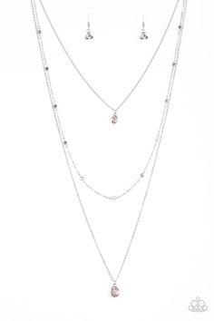 Three dainty silver chains layer down the chest. A glittery pink gem pendant swings from the uppermost chain, giving way to a shimmery silver chain embellished in glistening cube beading. Slightly larger in size, a matching pink gem pendant swings from the lowermost chain for a glamorous finish. Features an adjustable clasp closure. Sold as one individual necklace. Includes one pair of matching earrings. P2RE-PKXX-160XX Cheap Pink Metal Chain Necklace, Elegant Pink Metal Chain Necklace, Dainty Silver Rhinestone Necklace For Party, Pink Metal Jewelry With Adjustable Chain, Trendy Pink Sterling Silver Jewelry, Pink Metal Chain Necklace With Adjustable Chain, Sterling Silver Charm Necklace With Delicate Chain For Party, Pink Metal Chain Jewelry, Pink Sterling Silver Charm Necklace With Adjustable Chain