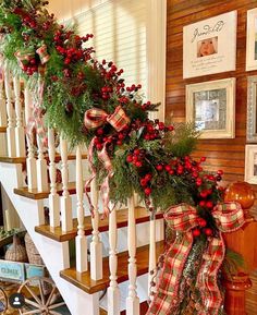 christmas decorations on the banisters and stairs