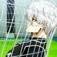 an anime character behind a soccer net