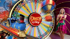 a woman standing in front of a wheel of fortune with the words crazy time on it