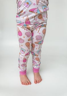 Snuggly soft and ready for snoozing, playing, & lounging all day, our jammies are designed with your little babe and dude in mind! Stretchy & breathable, our fabric is hypoallergenic, eco-friendly, antimicrobial, moisture wicking, and promotes thermoregulation. 95% viscose from bamboo; 5% spandex Machine wash cold and hang dry or tumble dry low Double zipper No interior tags Convertible foot cuffs on all sizes Convertible hand cuffs on sizes through 12M Designed to fit 3x longer than your averag Hand Cuffs, Hanging Dryer, Tumble Dryer, Moisture Wicking, Convertible, Bamboo, Eco Friendly, Spandex, Zipper