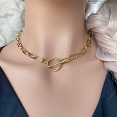 Thick Gold Choker with Paperclip Chain ꕥ 𝗢𝗨𝗥 𝗝𝗘𝗪𝗘𝗟𝗥𝗬 𝗜𝗦 ꕥ * High Quality * Handmade * Waterproof  * 100% Lead & Nickel Free  * Won't tarnish or discolour * Hypoallergenic * Recyclable ꕥ 𝗠𝗔𝗧𝗘𝗥𝗜𝗔𝗟𝗦 ꕥ * 18K Gold Plated PVD Stainless Steel * 17mm Paperclip Chain * 2cm Toggle Clasp ꕥ 𝗣𝗔𝗖𝗞𝗔𝗚𝗜𝗡𝗚 ꕥ * Every piece comes in their own bag * 100% Recyclable Packaging ♺ ꕥ 𝗢𝗥𝗗𝗘𝗥 𝗧𝗜𝗠𝗘𝗦 ꕥ * Orders are shipped out within 1 Day ꕥ 𝗦𝗛𝗜𝗣𝗣𝗜𝗡𝗚 ꕥ 𝑼𝑺𝑨 🇺🇸 * USPS via 1st Class Airmail (Tracked) * FREE SHIPPING for orders of $35+ * 3-10 Business Days Arrival Time 𝑪𝑨𝑵𝑨𝑫𝑨 🇨🇦 * Canada Post Regular Mail (Not Tracked) * FREE Regular Mail Shipping for all orders * FREE Tracked Shipping for orders of $100+ * 2-8 Business Days Arrival Time ➤ If you would like 𝑻𝒓𝒂 Casual Cheap Choker As Gift, Cute Adjustable Cheap Choker, Cheap Choker Necklace For Gifts, Luxury Adjustable Chic Choker, Cheap Adjustable Choker Chain Necklace, Cheap Adjustable Length Choker As Gift, Cheap Adjustable Choker As Gift, Luxury Choker With Adjustable Chain For Gift, Affordable Adjustable Chain Choker Necklace