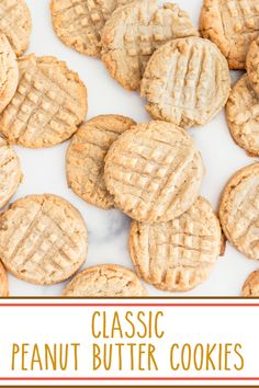 peanut butter cookies on a white surface with the words classic peanut butter cookies above them