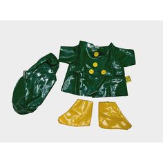 a green and yellow outfit with boots