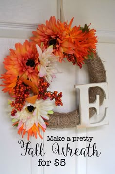 a fall wreath hanging on the front door with words that read make a pretty fall wreath