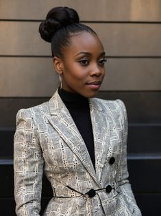 41 Sleek Bun Hairstyles for Black Women: A Style Guide Natural Sleek Bun