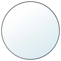 a round mirror is shown in black and white, with a thin border around the edges