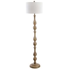 a tall wooden floor lamp with a white shade on the top and bottom part of it